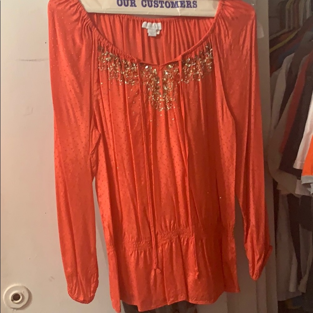 Beautiful orange tunic with some sparkling details